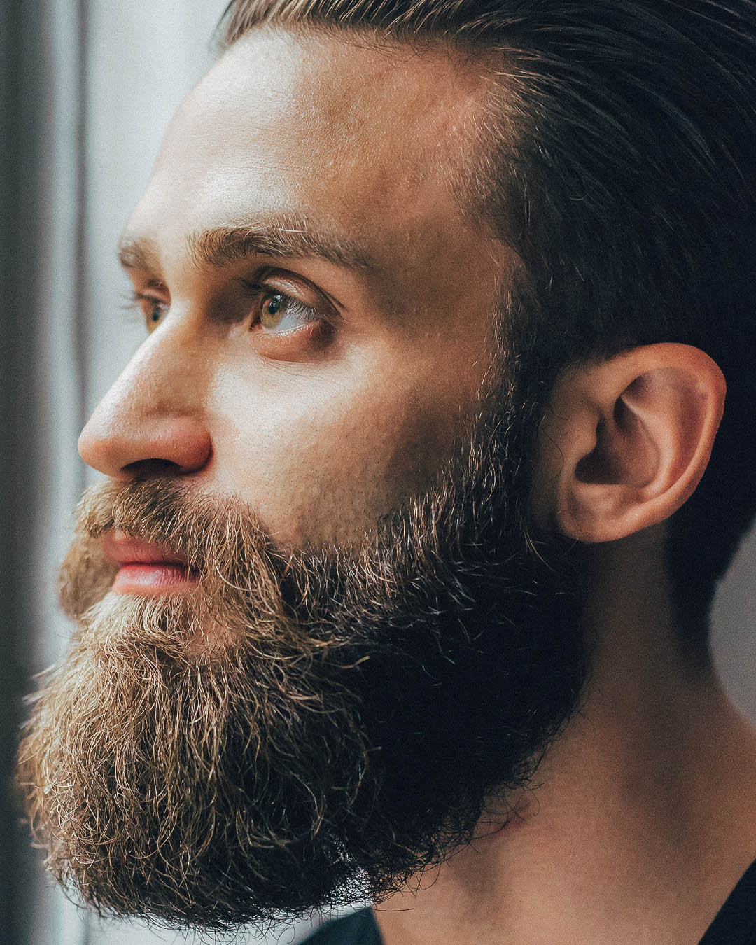 A bearded man after using beard oil
