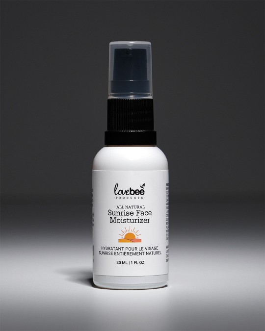 A white bottle of Sunrise Face Moisturizer