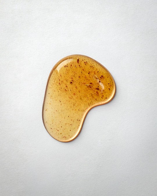 A honey coloured drop of Brilliance Face Mask