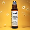 A chamomile essential oil roll on in an amber glass bottle