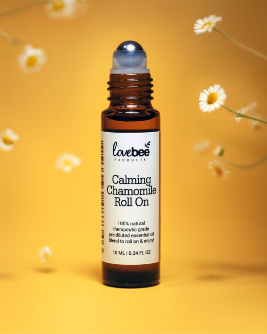 A chamomile essential oil roll on in an amber glass bottle