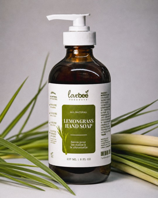 Amber glass bottle with a white pump containing lemongrass hand soap